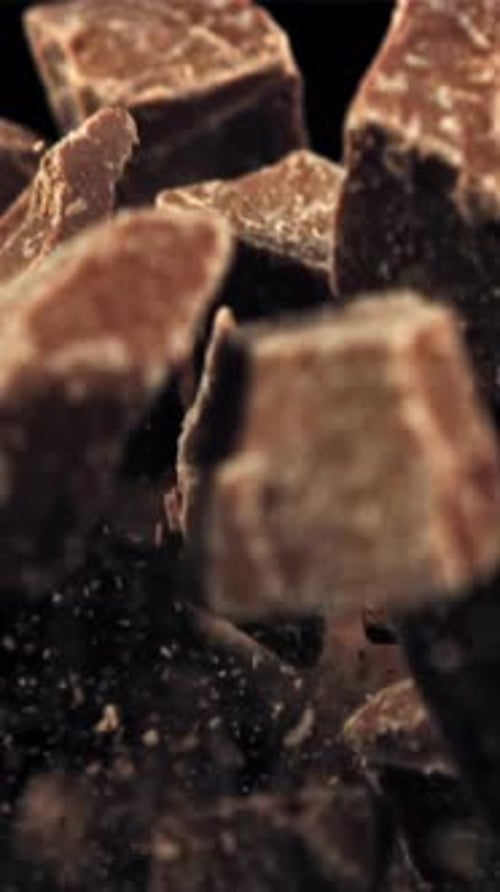 Chunks of Chocolate Fly Up and Fall Down Filmed on a Highspeed Camera at 1000 Fps