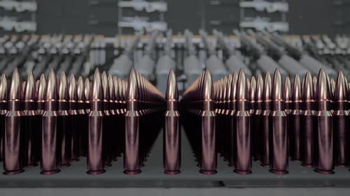 Rows of Military Ammunition and Rifles in an Armory