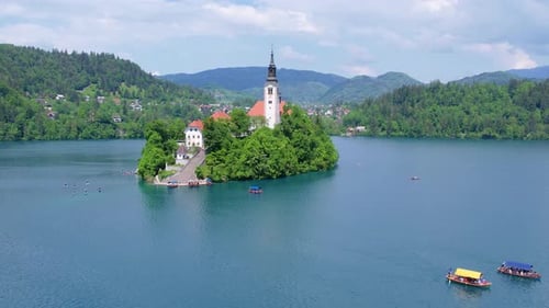 Aerial View of Church of Assumption of Mary in Center of Lake Bled Slovenia