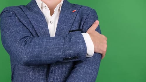 Man Rubs Shoulder for Pain on Green Screen