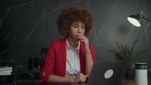 Stressed Young Businesswoman at Work