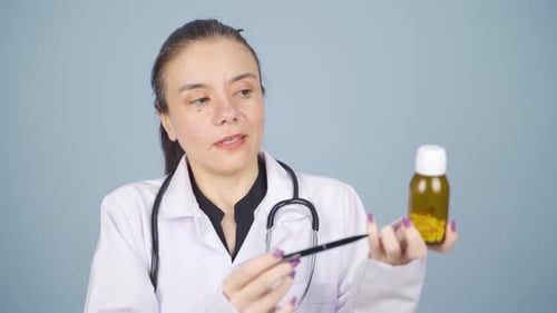 Doctor describing medicine on Facetime.