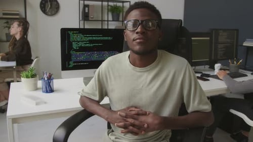 Portrait of African American Programmer Working in Office