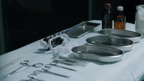 Sterile Surgical Instruments Arranged on a Blue Drape