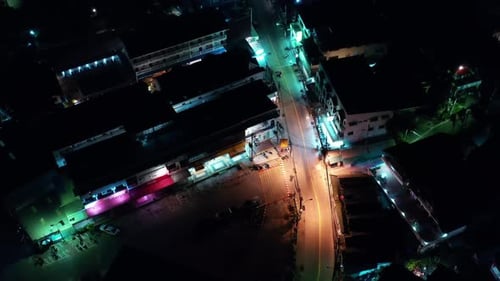 Top view of the nigh City. Night road of Asian megapolis aerial view. Scooter traffic.Aerial.Flying
