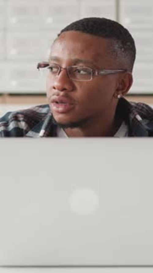 African American Student Touches Laptop