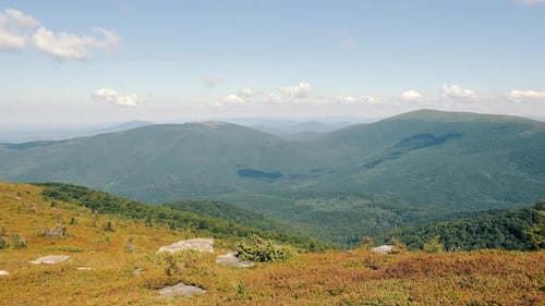 Beautiful Landscape of Mountains Covered with Green Trees and Bushes on a Summer Sunny Day Hiking in