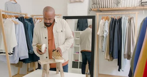 Man shoe shopping in a store