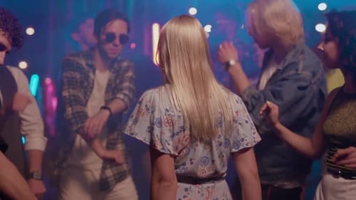 Young Adults Dancing and Enjoying Party Vibe at Night