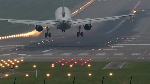 Airplane Landing at the Airport