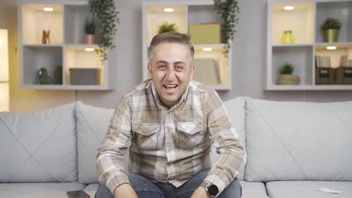 Man looking at camera confused.