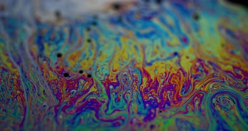 Abstract Swirling Soap Bubble Surface with Vibrant Colors