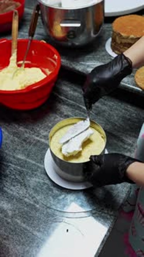 A tutor guides a child through the steps of making delightful desserts while sharing laughter and le