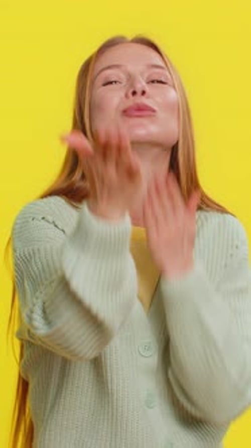 Smiling Romantic Happy Woman Sending Lots of Air Kisses Looking at Camera Love Confession Concept