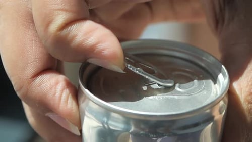 Opening an Aluminum Can of Soda
