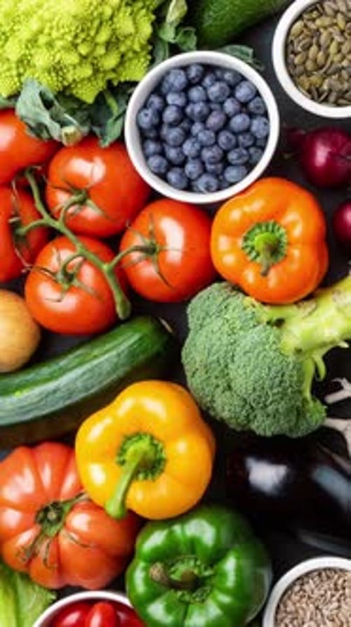 Fresh Vegetables and Fruits overhead in Vertical Frame