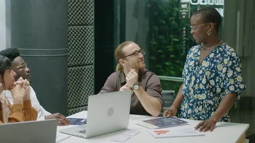 Team Meeting and Collaboration in a Modern Office