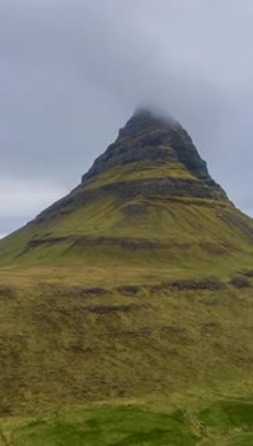 Kirkjufell Mountain on Summer Day Iceland Aerial View Vertical Video