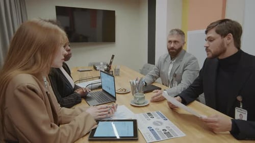 Business Partners Discussing Project and Giving High Five on Office Meeting