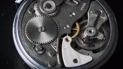 The Mechanism of Vintage Stopwatch Rotates CloseUp