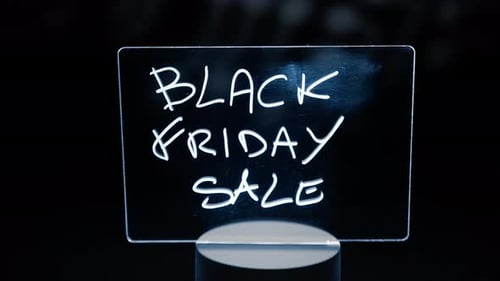 Glowing Black Friday Sale Sign on Dark Background