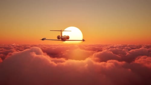 Private Jet in Sunset Clouds
