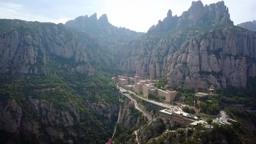 Drone footage of an epic mountain settlement called Montserrat in the foothills of Spain close to