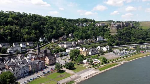 Aerial flying drone shot, tracking up, of the Rhine River Valley and Old Architecture - including me