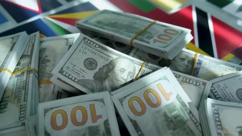Stacks of US Currency on World Flags