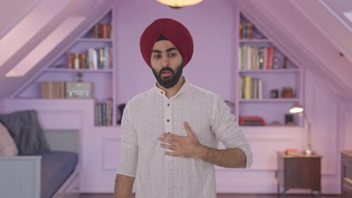 Man Coughing and Looking Sick Indoors