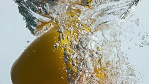 Peppers Plunging into Water
