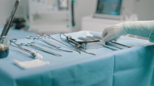 Sterile Surgical Instruments on Table in Operating Room
