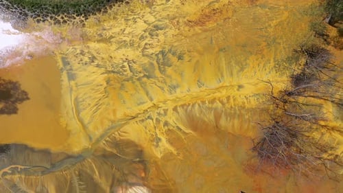 Aerial view of abstract poisonous colorful residual mining water background
