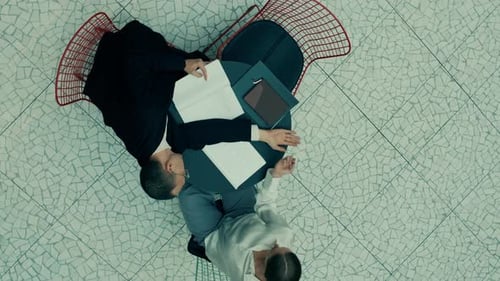 Top Down View Shot of Business Couple Starting Dancing during Paperwork