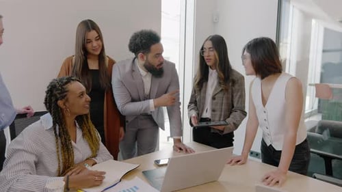 A Diverse Team of Professionals Collaborating Effectively in a Modern Office Setting