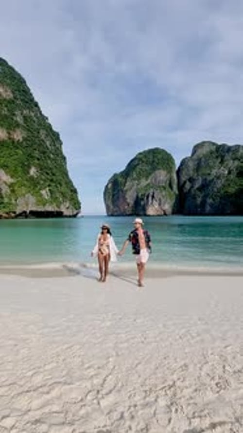 Strolling Hand in Hand Along the Pristine Beaches of Koh Phi Phi Thailand