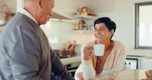 Mature Woman Enjoying Coffee with Friend
