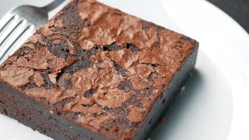 Delicious Chocolate Brownie on a Plate with Fork