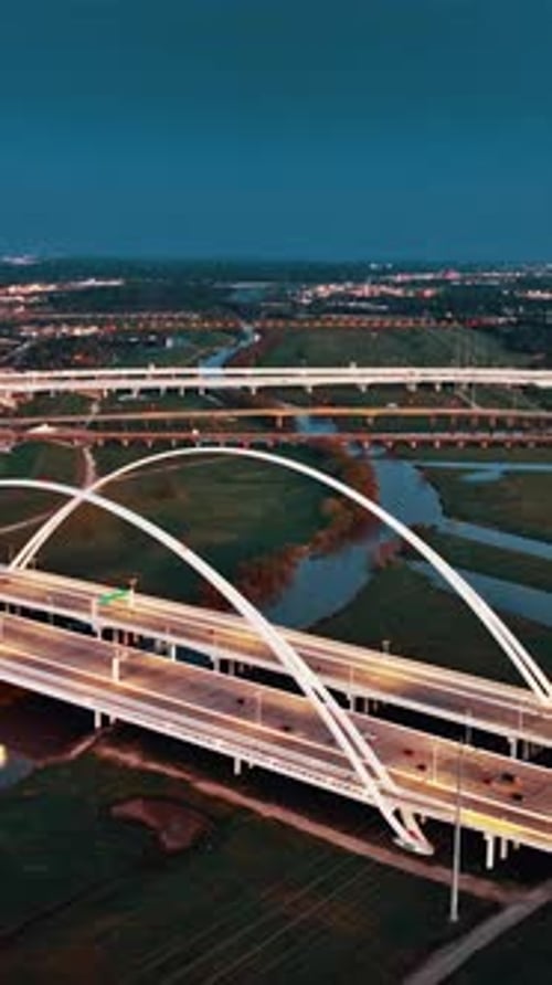 Aerial view of illuminated highways and rivers in Dallas at night