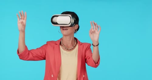 Woman Using Virtual Reality Headset on Blue Background
