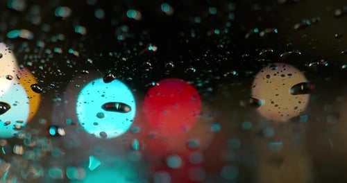 Rain Drops with Colorful Bokeh at Night