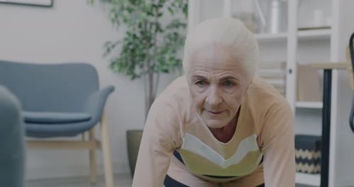 Senior Woman Doing Yoga at Home