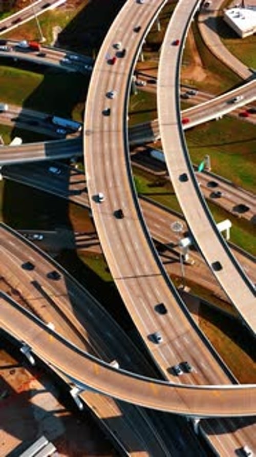 Network of highways and freeways in the downtown of modern city. Aerial view of Dallas
