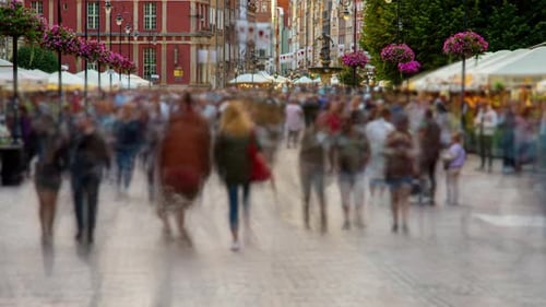 Timelapse of Pedestrians Walking Along Brightly Lit Street in Old City Centre at Evening