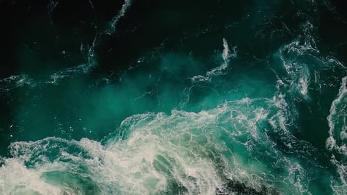 Waves of water of the river and the sea meet each other during high tide and low tide.