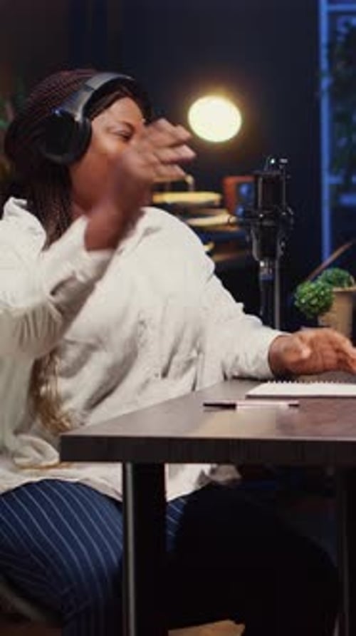 Vertical Video Woman on Podcast Talking with Guest During Marathon Streaming Live Broadcast
