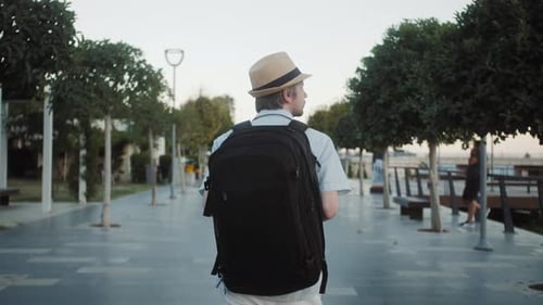 Happy Tourist Man Walking to Airport Terminal