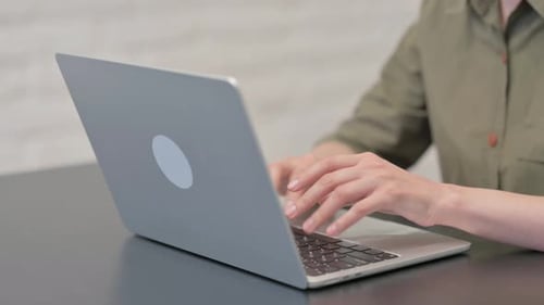 Close up Male Hands Typing on Laptop