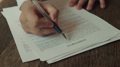Businessman Hands Checking Agreement Close Up