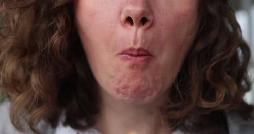 Adult Eating Waffle in Close Up Shot